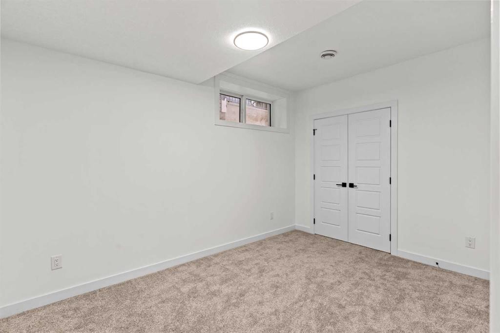 116 Ambleside Crescent Nw, Calgary, AB - Indoor Photo Showing Other Room