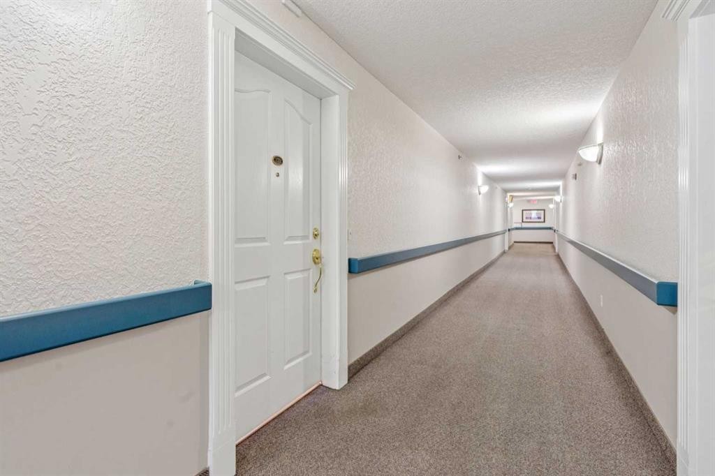 2327-1818 Simcoe Boulevard Sw, Calgary, AB - Indoor Photo Showing Other Room
