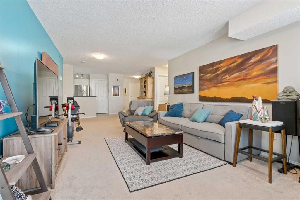 2327-1818 Simcoe Boulevard Sw, Calgary, AB - Indoor Photo Showing Living Room