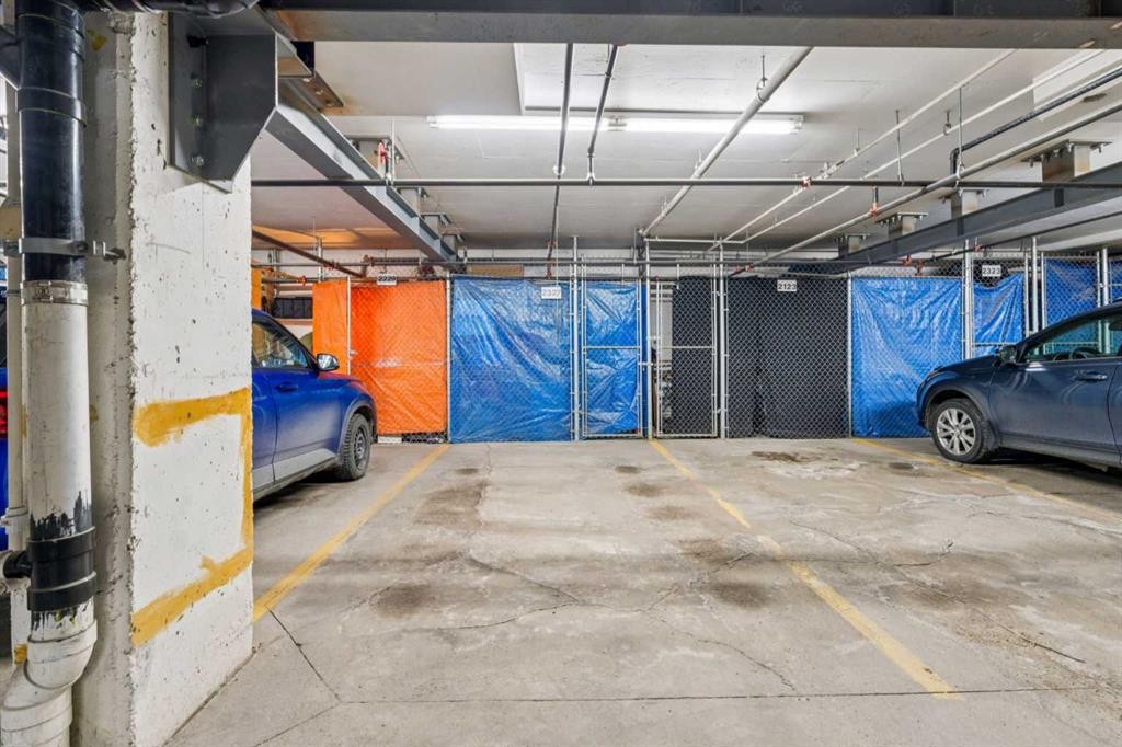 2327-1818 Simcoe Boulevard Sw, Calgary, AB - Indoor Photo Showing Garage
