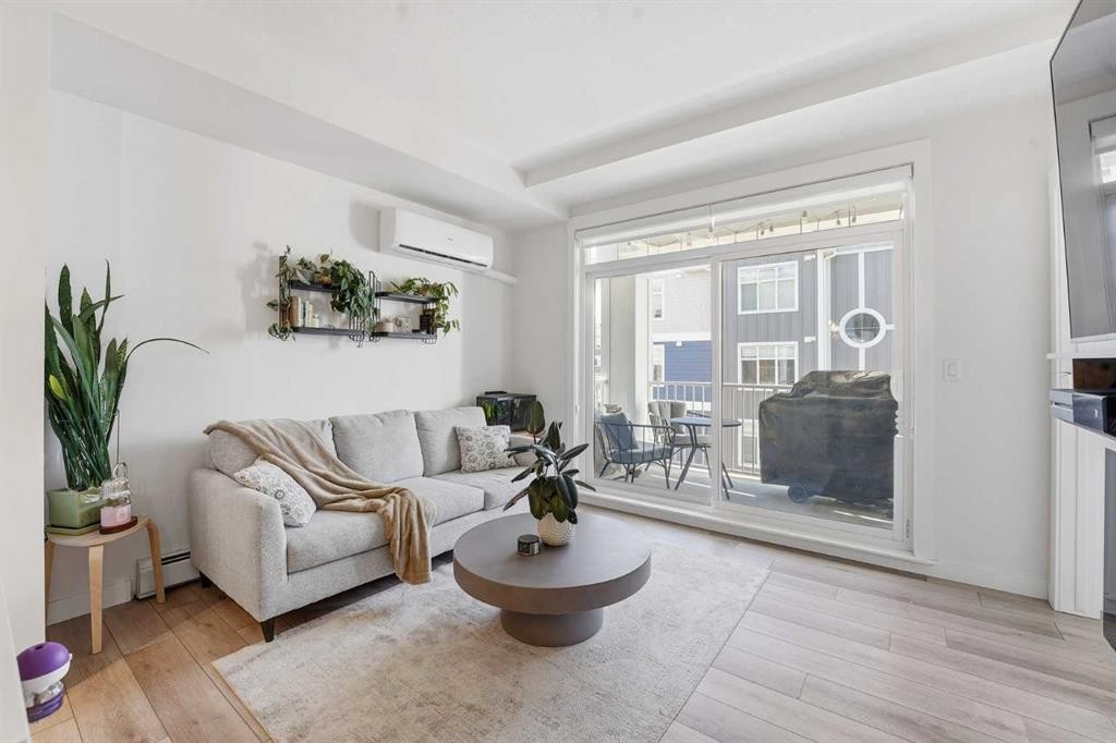 308-400 Auburn Meadows Common Se, Calgary, AB - Indoor Photo Showing Living Room