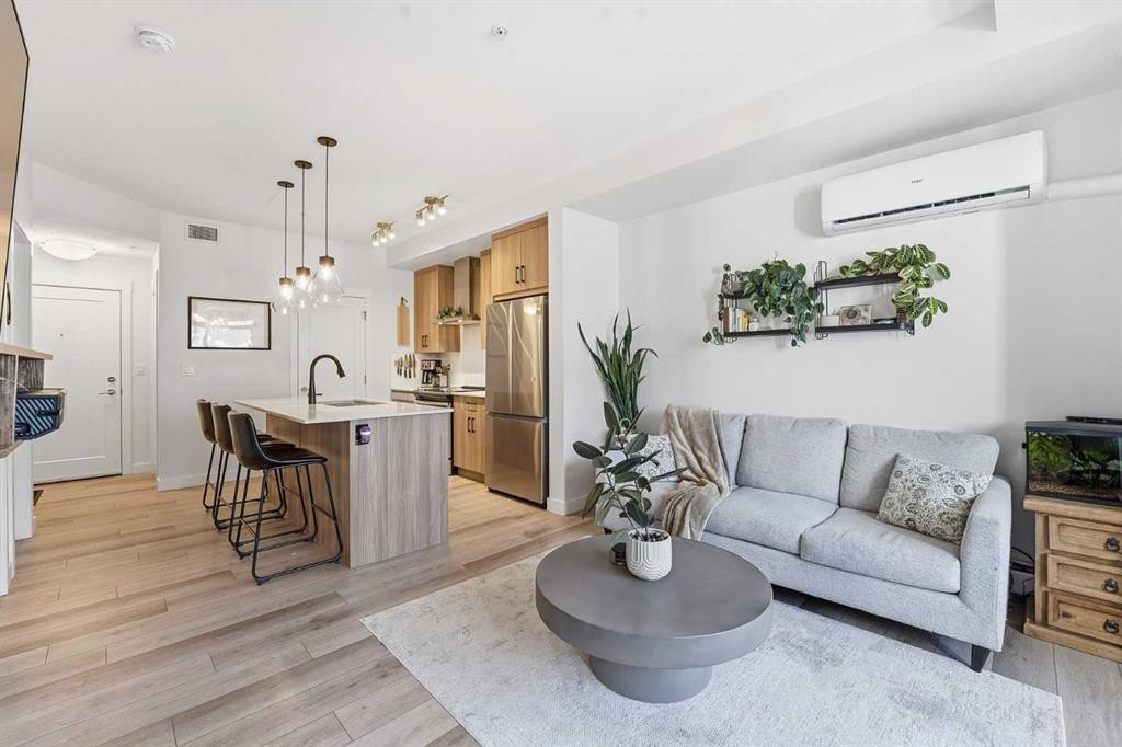 308-400 Auburn Meadows Common Se, Calgary, AB - Indoor Photo Showing Living Room