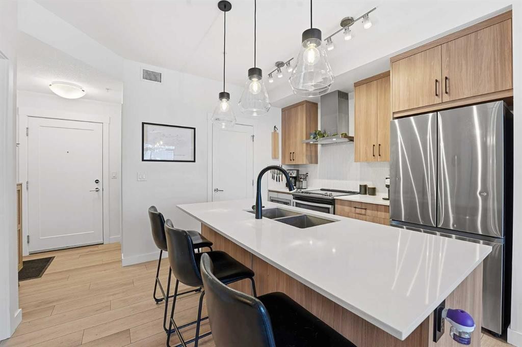 308-400 Auburn Meadows Common Se, Calgary, AB - Indoor Photo Showing Kitchen With Stainless Steel Kitchen With Double Sink With Upgraded Kitchen