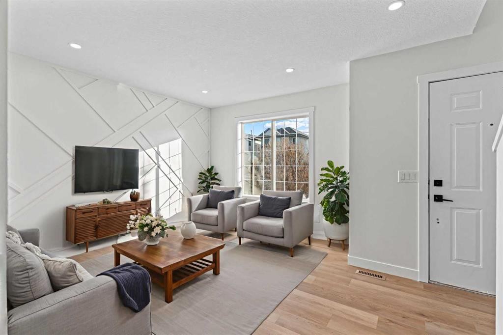 52 Martin Crossing Rise Ne, Calgary, AB - Indoor Photo Showing Living Room