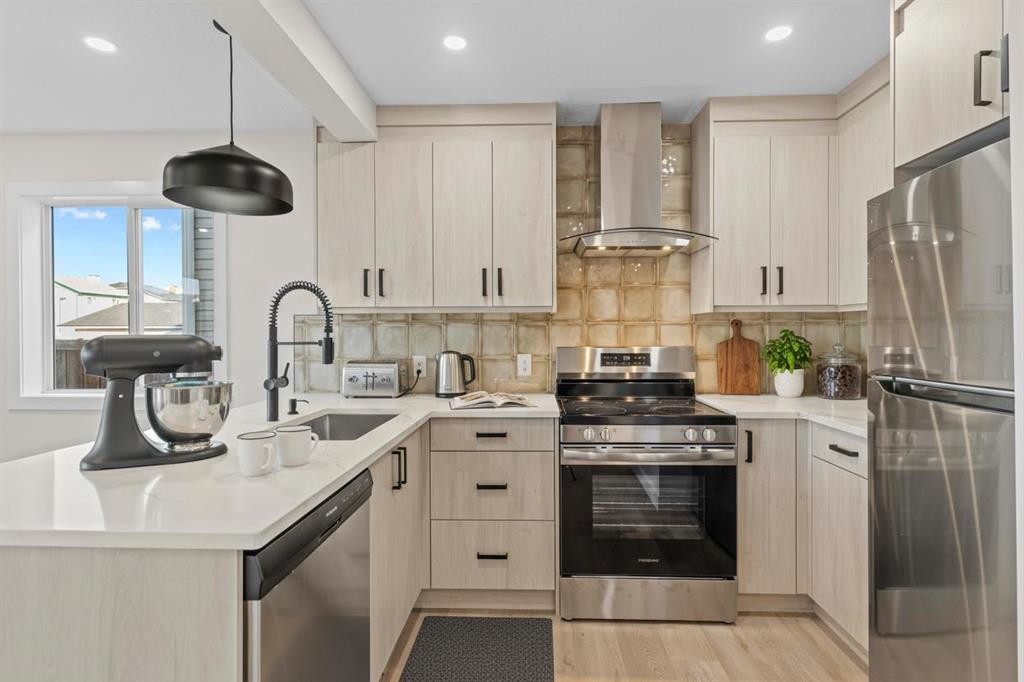 52 Martin Crossing Rise Ne, Calgary, AB - Indoor Photo Showing Kitchen With Upgraded Kitchen