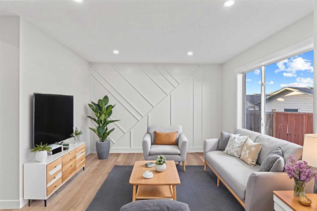 52 Martin Crossing Rise Ne, Calgary, AB - Indoor Photo Showing Living Room