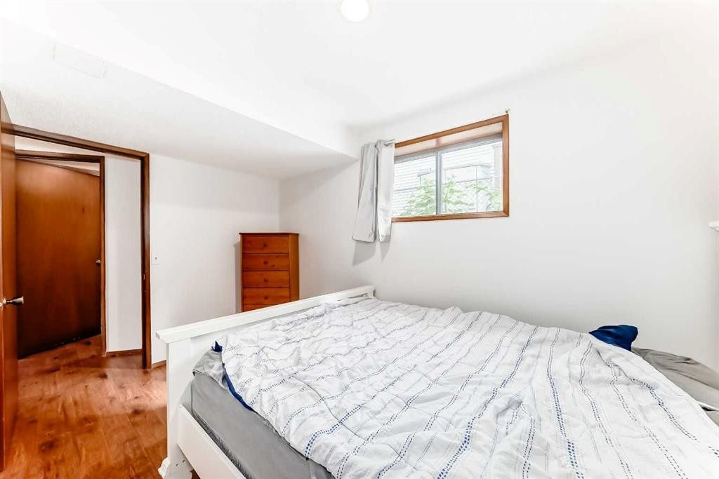 22 Glenhill Drive, Cochrane, AB - Indoor Photo Showing Bedroom