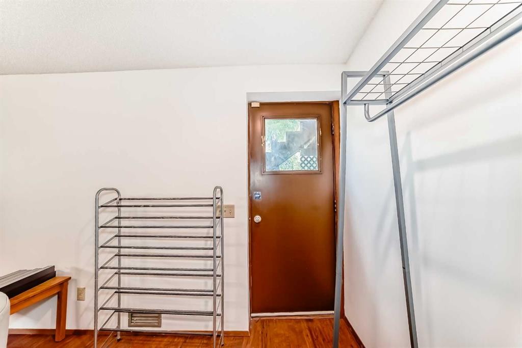 22 Glenhill Drive, Cochrane, AB - Indoor Photo Showing Other Room