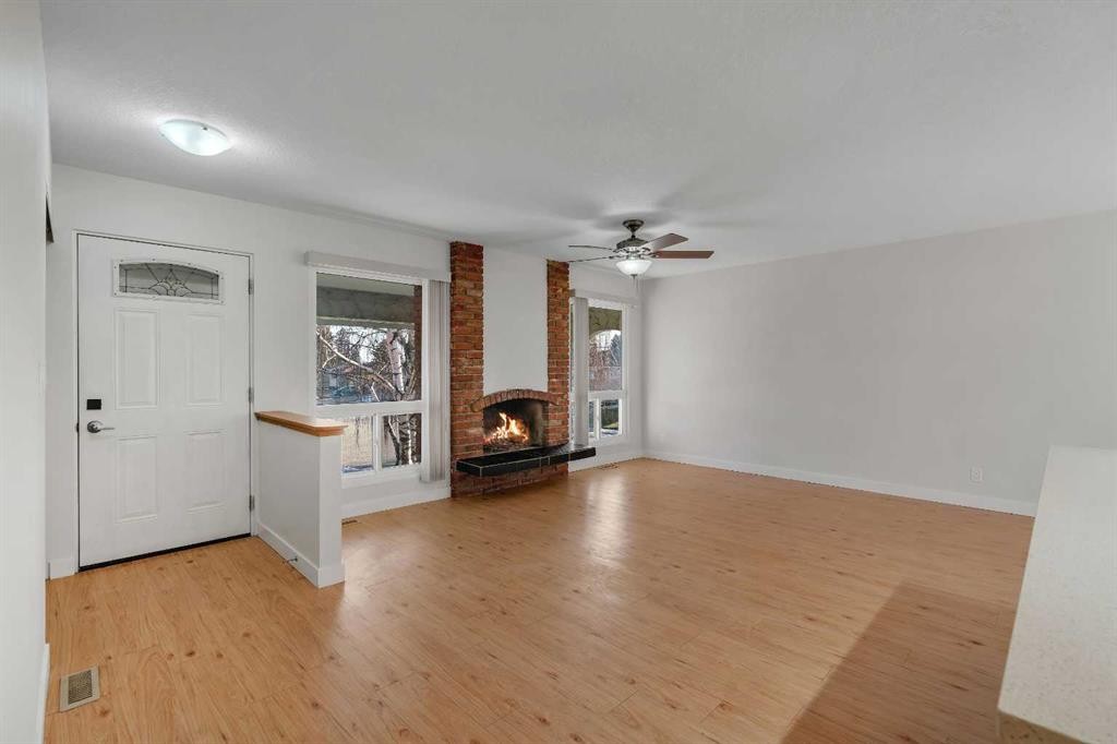 102 Huntham Place Ne, Calgary, AB - Indoor With Fireplace