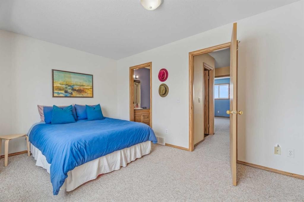 1301 Eagleview Place Nw, High River, AB - Indoor Photo Showing Bedroom