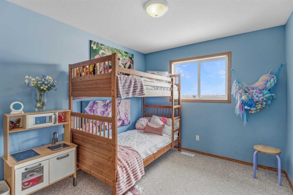 1301 Eagleview Place Nw, High River, AB - Indoor Photo Showing Bedroom