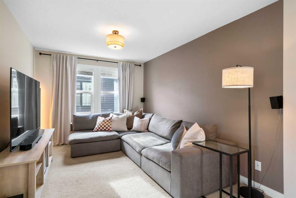 346 Cooperstown Common Sw, Airdrie, AB - Indoor Photo Showing Living Room