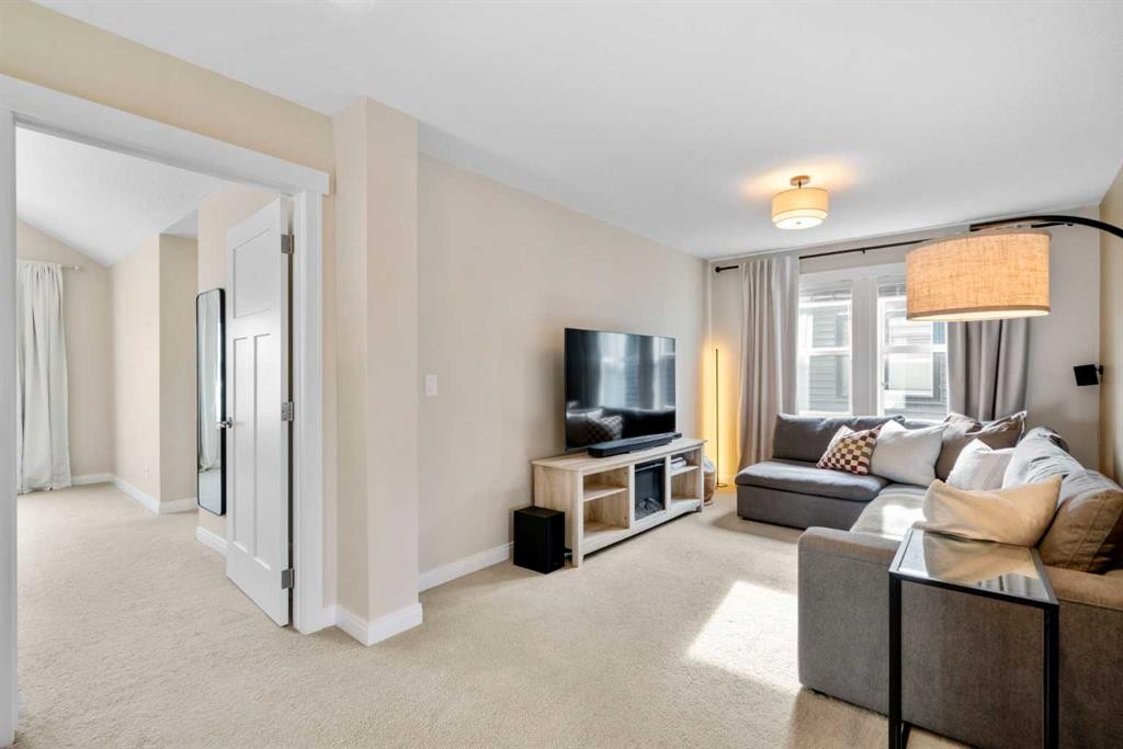 346 Cooperstown Common Sw, Airdrie, AB - Indoor Photo Showing Living Room