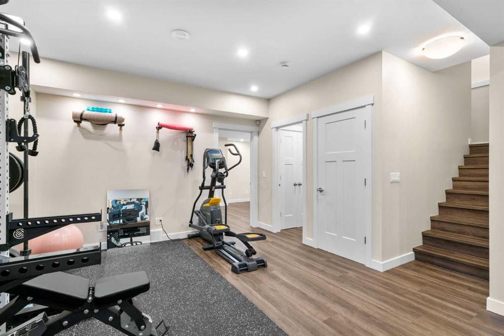 346 Cooperstown Common Sw, Airdrie, AB - Indoor Photo Showing Gym Room