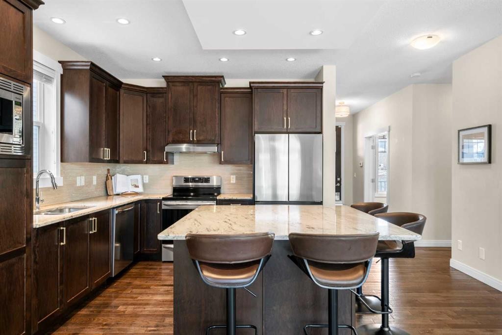 346 Cooperstown Common Sw, Airdrie, AB - Indoor Photo Showing Kitchen With Upgraded Kitchen