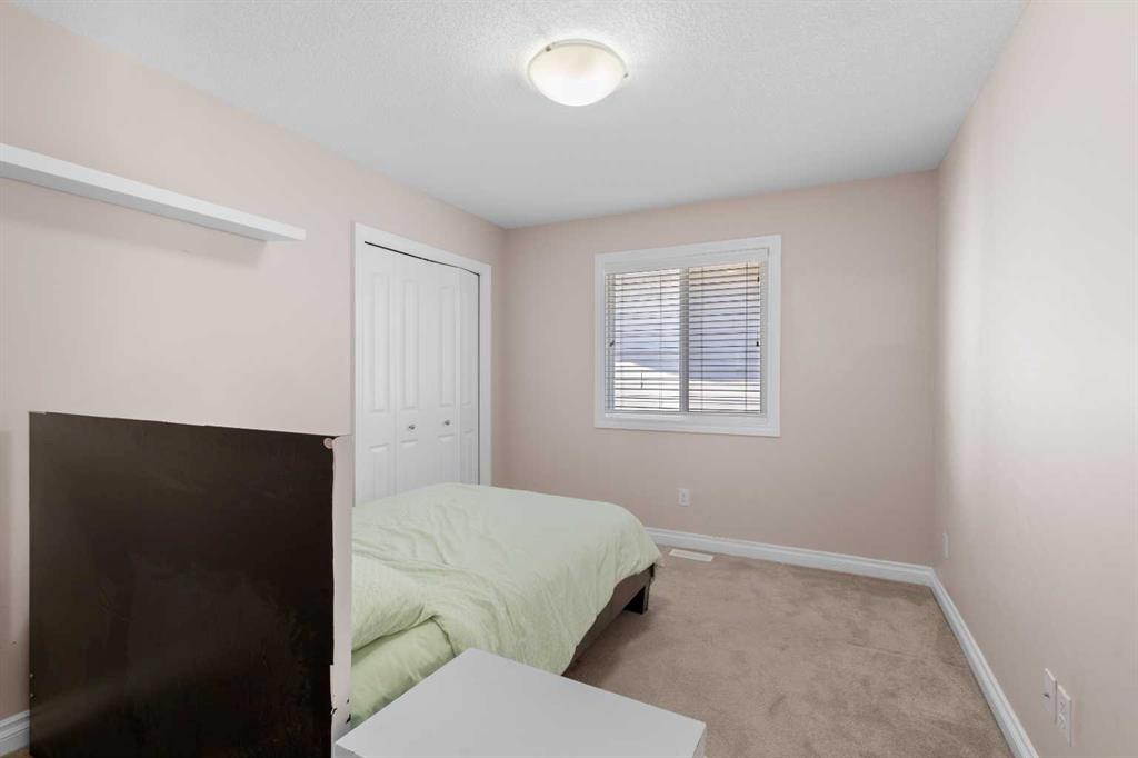 529 Saddlelake Drive Ne, Calgary, AB - Indoor Photo Showing Bedroom