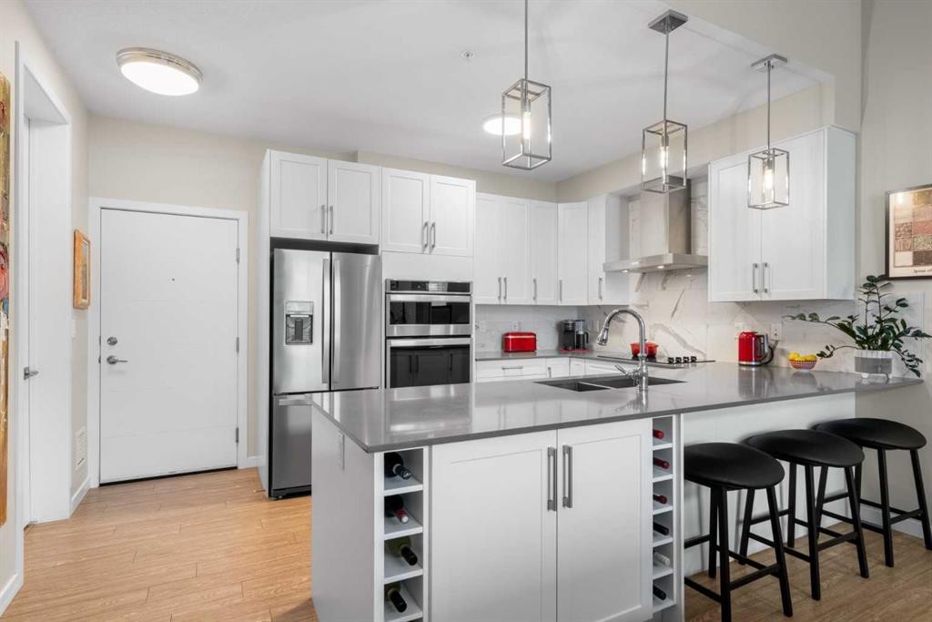 607-11 Mahogany Circle Se, Calgary, AB - Indoor Photo Showing Kitchen With Upgraded Kitchen