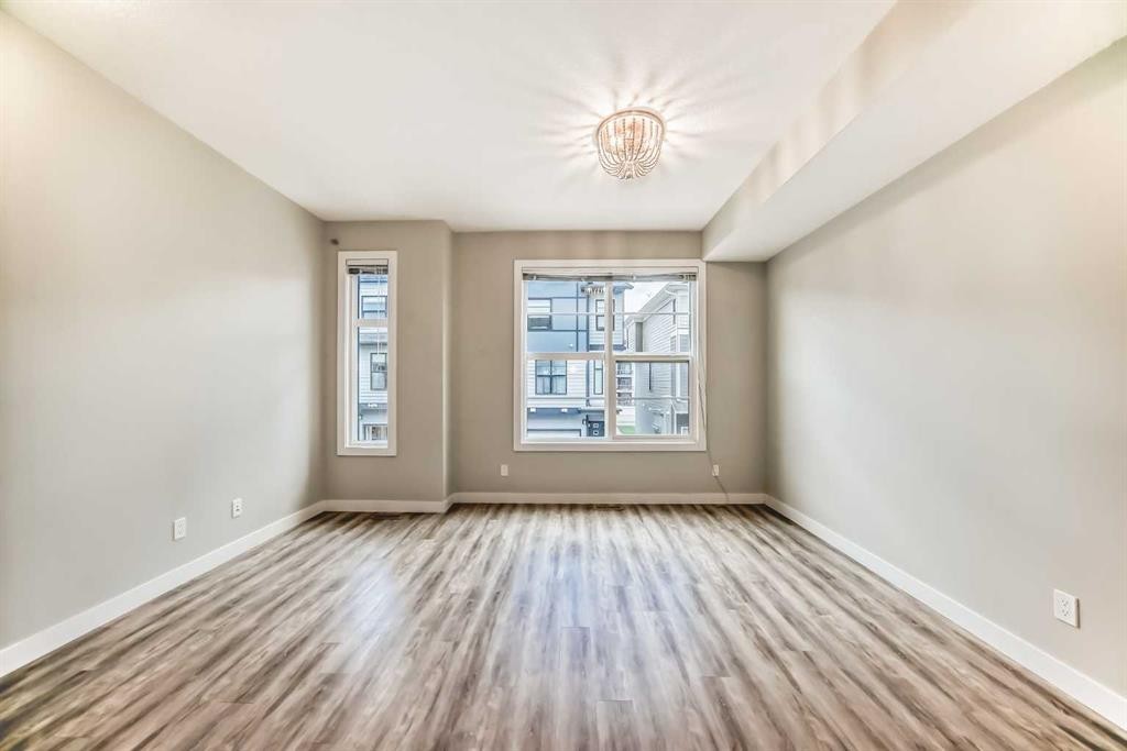 58-138 Seton Passage Se, Calgary, AB - Indoor Photo Showing Other Room