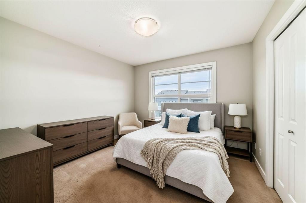 58-138 Seton Passage Se, Calgary, AB - Indoor Photo Showing Bedroom