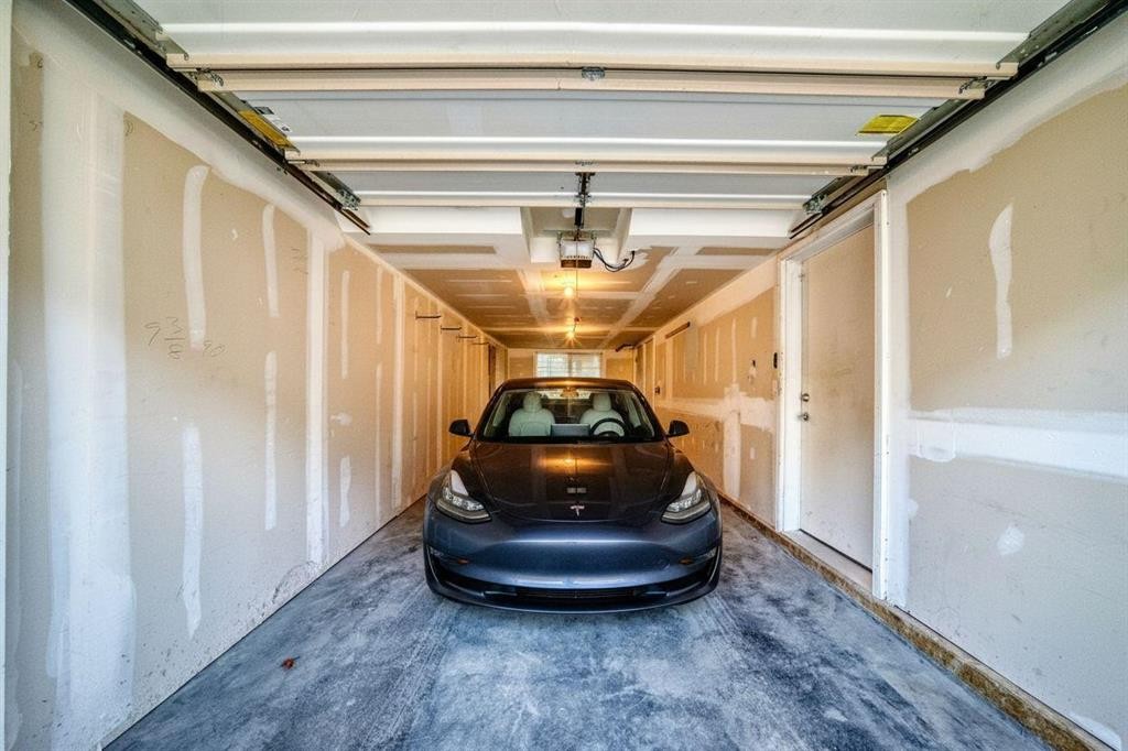 58-138 Seton Passage Se, Calgary, AB - Indoor Photo Showing Garage