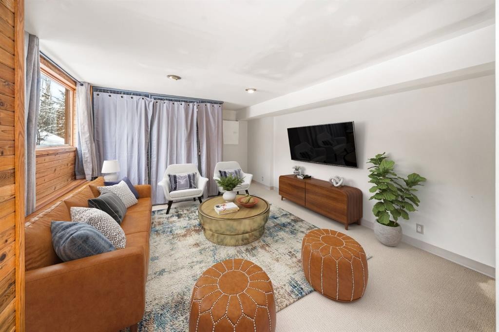8-838 3Rd Street, Canmore, AB - Indoor Photo Showing Living Room