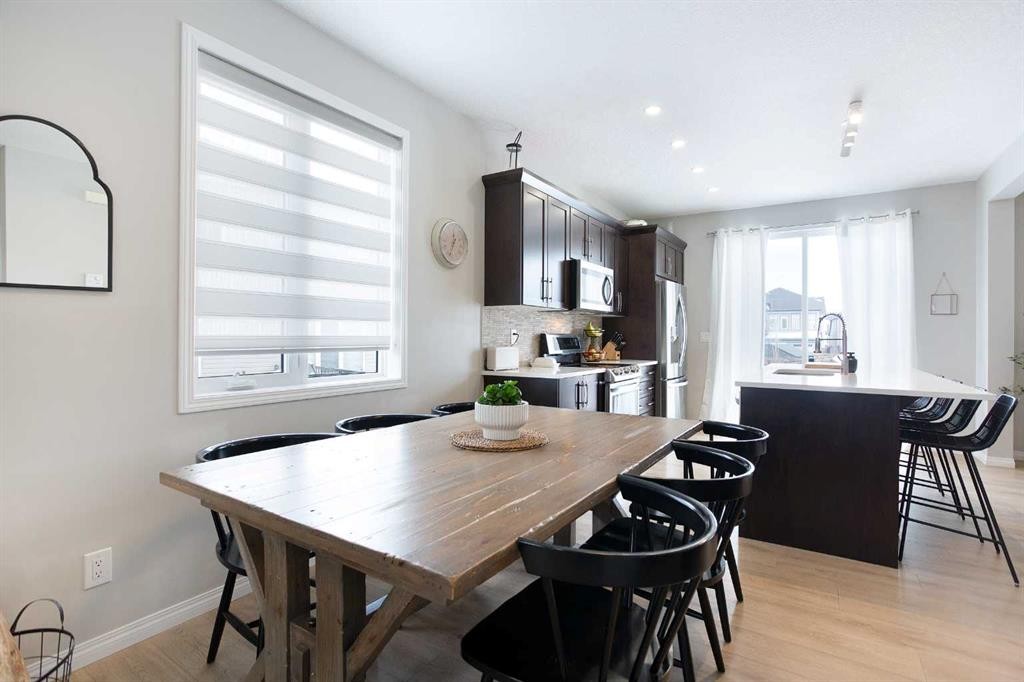 2 Osborne Common Sw, Airdrie, AB - Indoor Photo Showing Dining Room