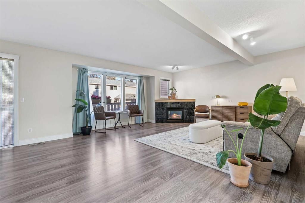 392 Killarney Glen Court Sw, Calgary, AB - Indoor Photo Showing Living Room With Fireplace