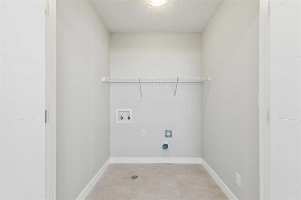 12 Willow Park Point, Cochrane, AB - Indoor Photo Showing Other Room