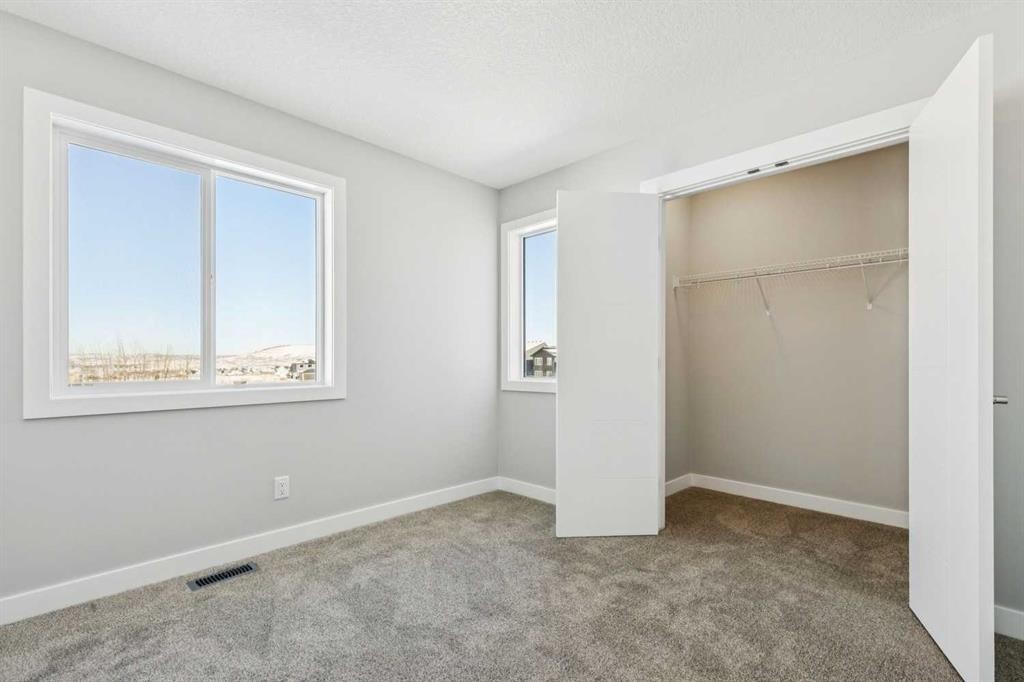 12 Willow Park Point, Cochrane, AB - Indoor Photo Showing Other Room