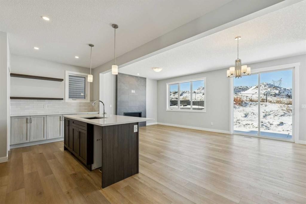 12 Willow Park Point, Cochrane, AB - Indoor Photo Showing Kitchen With Upgraded Kitchen