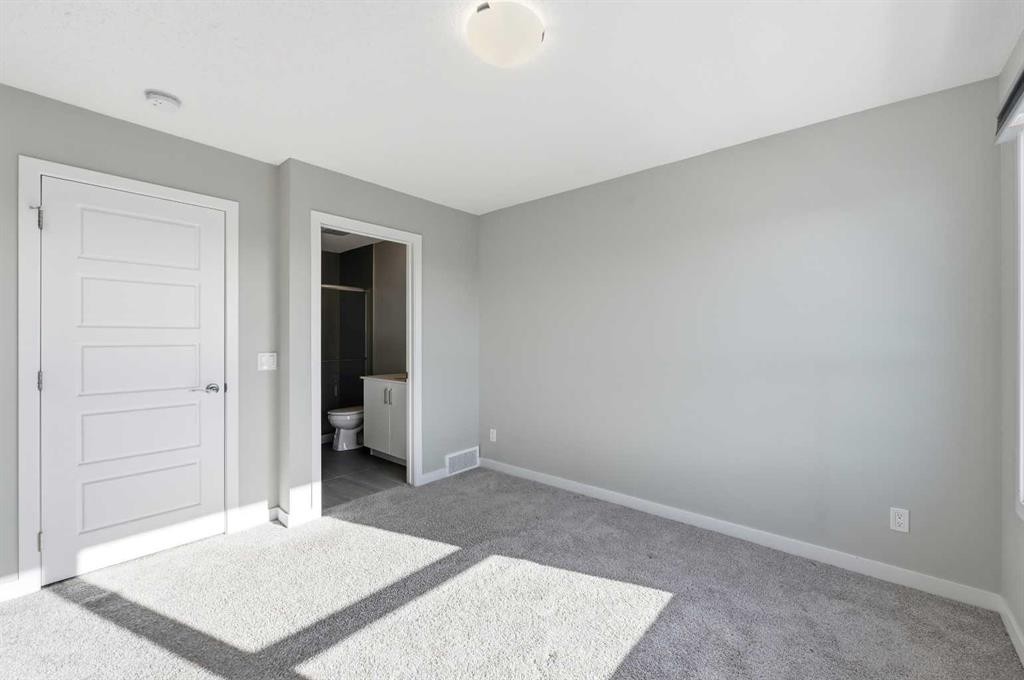 125-301 Redstone Boulevard Ne, Calgary, AB - Indoor Photo Showing Other Room