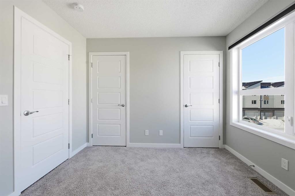 125-301 Redstone Boulevard Ne, Calgary, AB - Indoor Photo Showing Other Room
