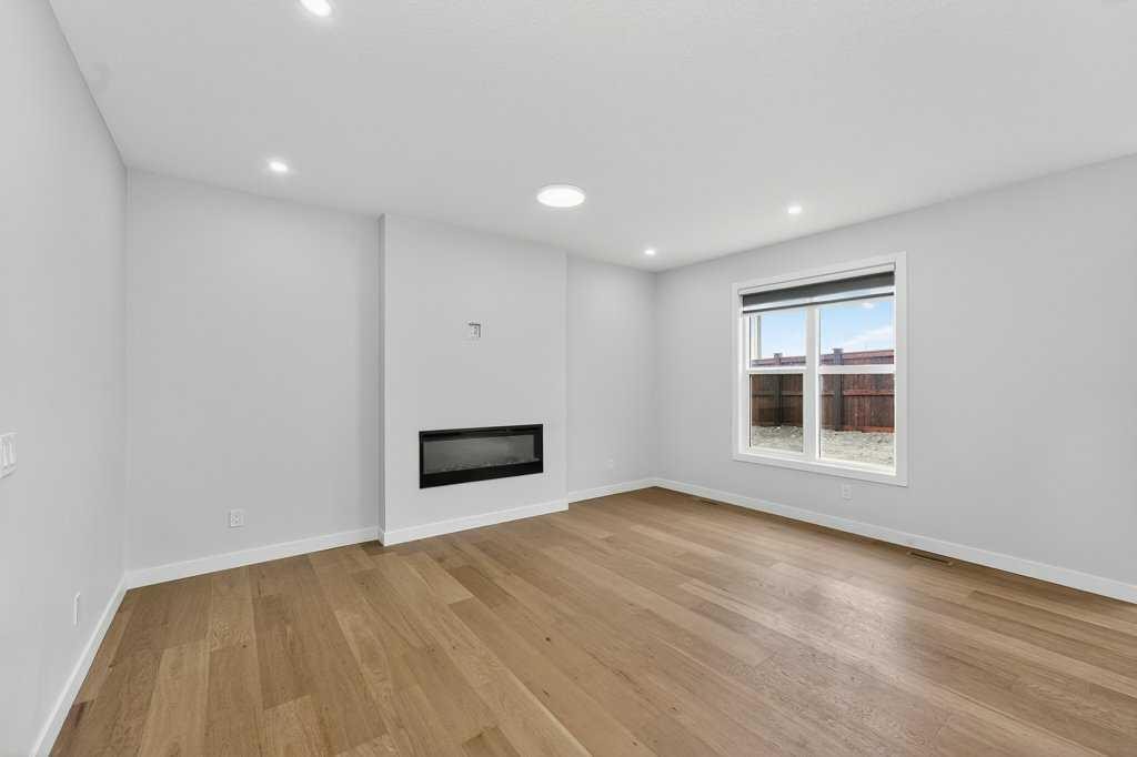 268 Cornerbrook Road Ne, Calgary, AB - Indoor With Fireplace