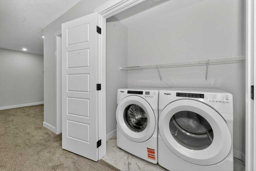 268 Cornerbrook Road Ne, Calgary, AB - Indoor Photo Showing Laundry Room