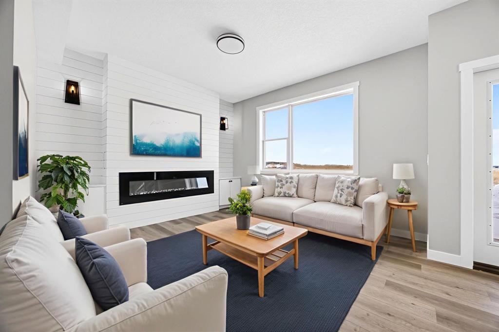 3426 Victory Way, Olds, AB - Indoor Photo Showing Living Room With Fireplace