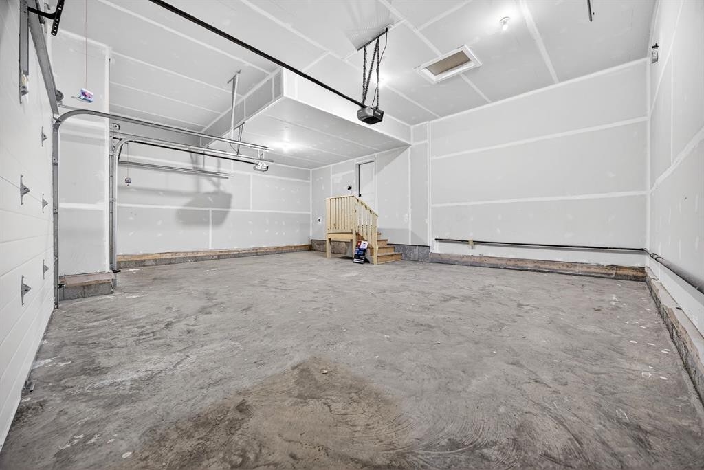 3426 Victory Way, Olds, AB - Indoor Photo Showing Garage