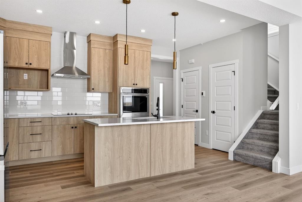 3426 Victory Way, Olds, AB - Indoor Photo Showing Kitchen With Upgraded Kitchen