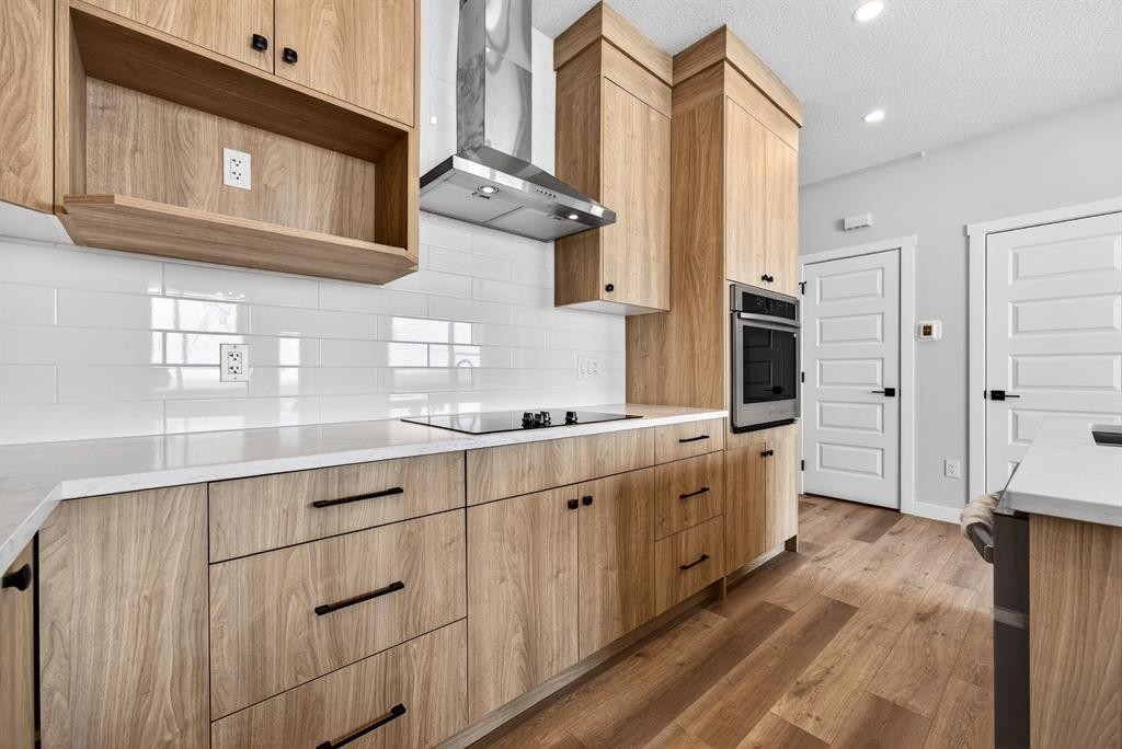 3426 Victory Way, Olds, AB - Indoor Photo Showing Kitchen With Upgraded Kitchen