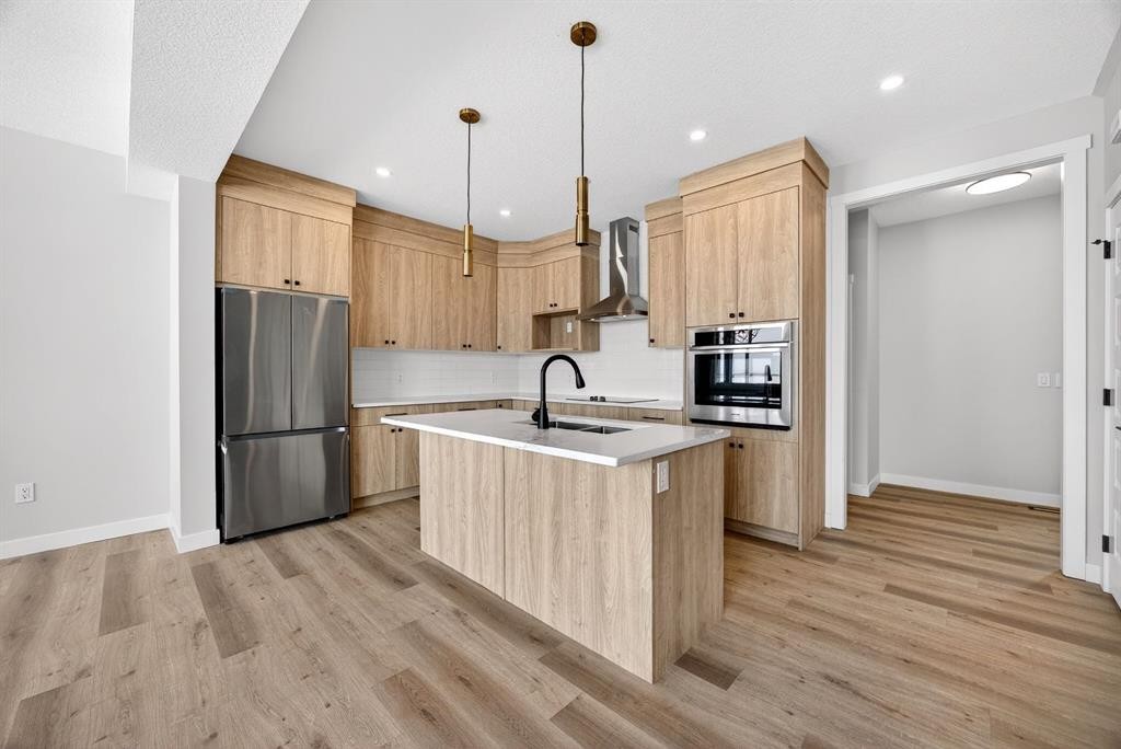 3426 Victory Way, Olds, AB - Indoor Photo Showing Kitchen With Upgraded Kitchen