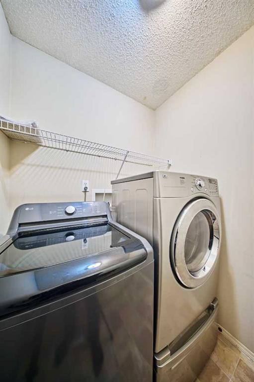215 Coventry Green Ne, Calgary, AB - Indoor Photo Showing Laundry Room