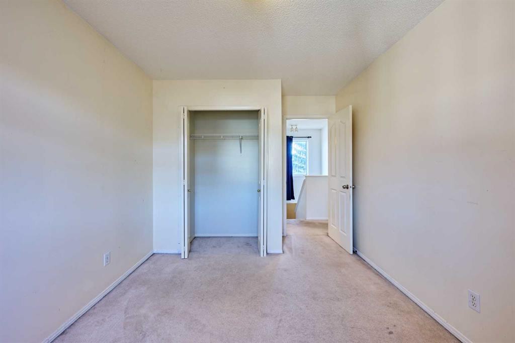 215 Coventry Green Ne, Calgary, AB - Indoor Photo Showing Other Room