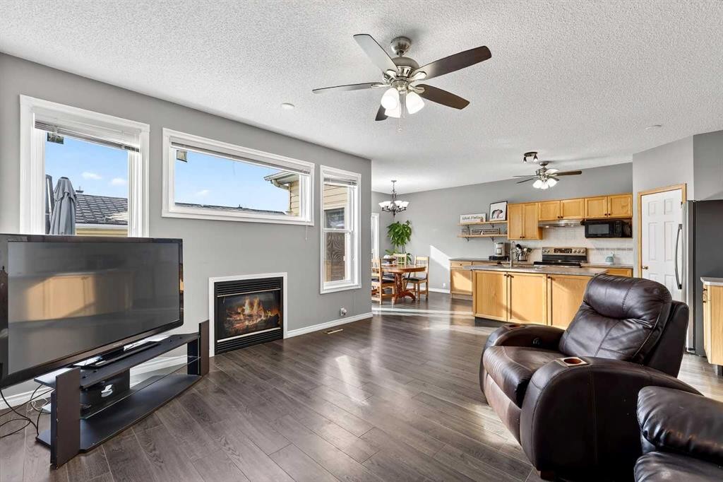 1153 Prestwick Circle Se, Calgary, AB - Indoor Photo Showing Living Room With Fireplace