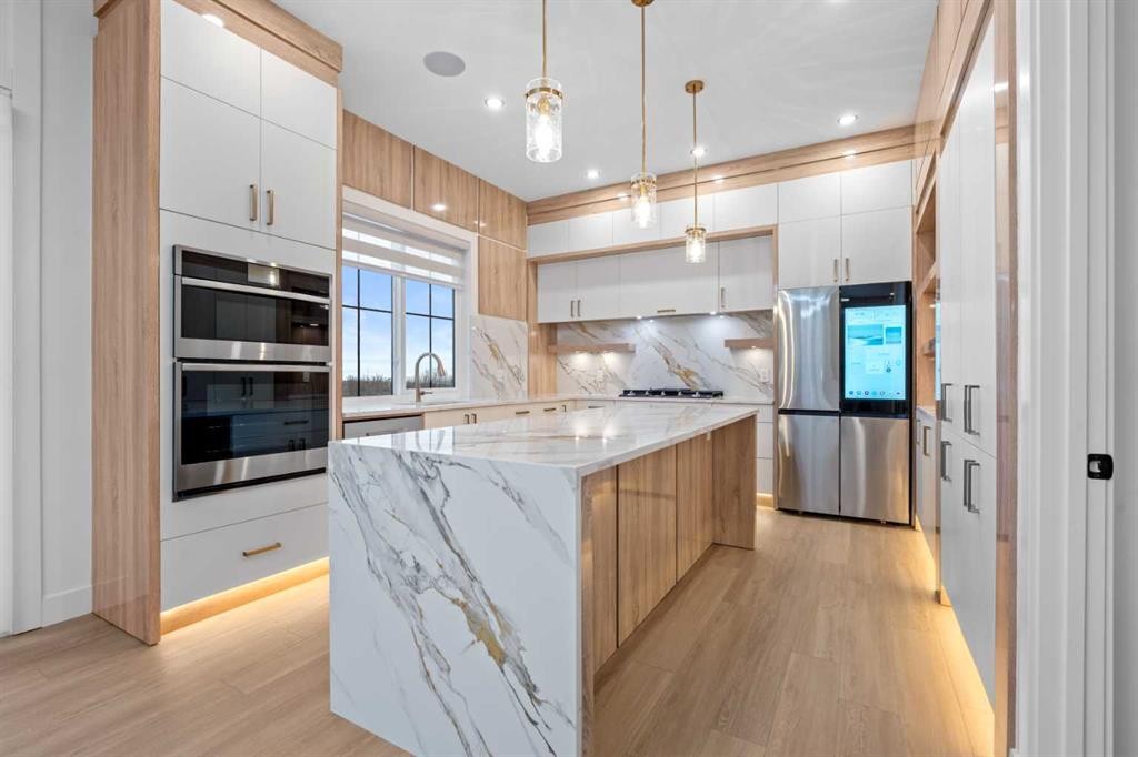 230 Royal Birch View Nw, Calgary, AB - Indoor Photo Showing Kitchen With Upgraded Kitchen