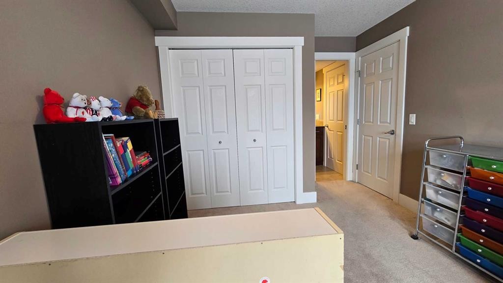 128-500 Rocky Vista Gardens Nw, Calgary, AB - Indoor Photo Showing Other Room