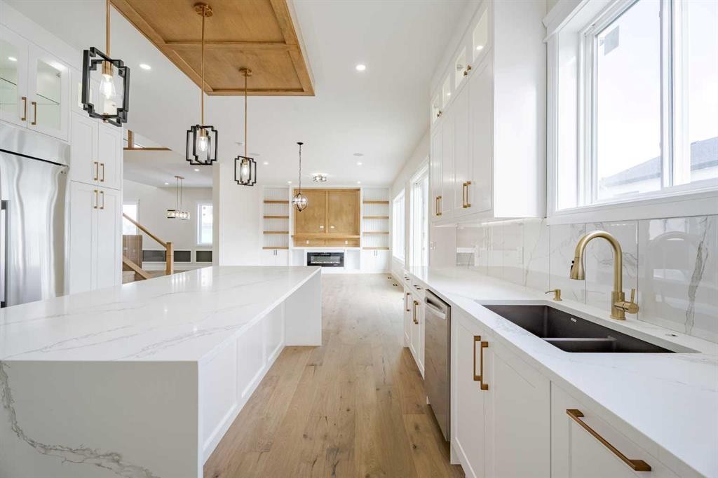 312 Watercrest Place, Chestermere, AB - Indoor Photo Showing Kitchen With Double Sink With Upgraded Kitchen