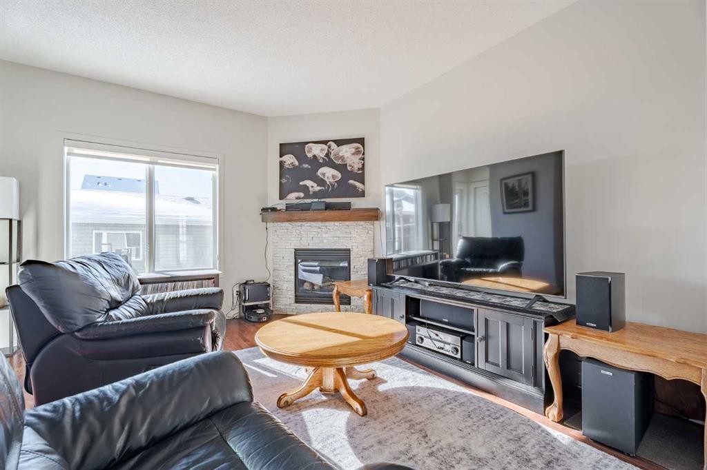 29 Evansridge Circle Nw, Calgary, AB - Indoor Photo Showing Living Room With Fireplace