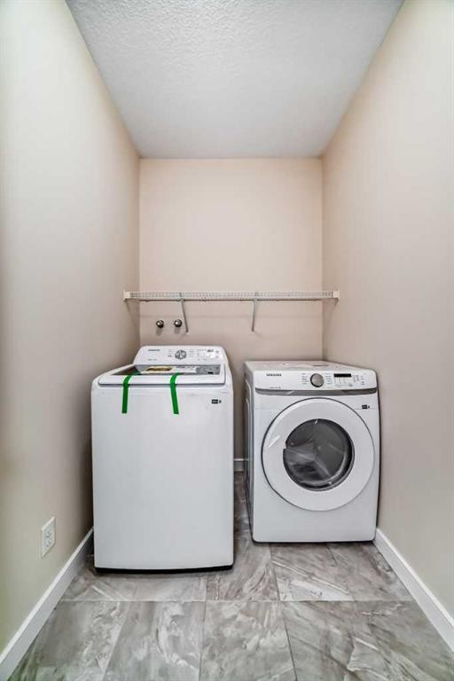 437 Redstone Grove Ne, Calgary, AB - Indoor Photo Showing Laundry Room