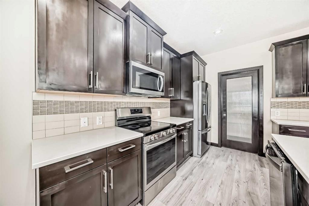437 Redstone Grove Ne, Calgary, AB - Indoor Photo Showing Kitchen With Upgraded Kitchen