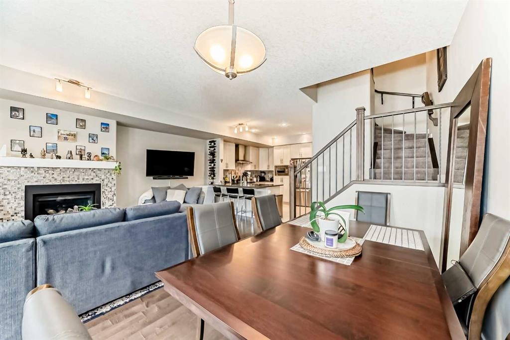 106 Cougar Ridge Landing Sw, Calgary, AB - Indoor With Fireplace
