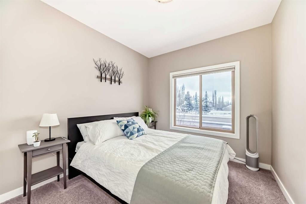 106 Cougar Ridge Landing Sw, Calgary, AB - Indoor Photo Showing Bedroom